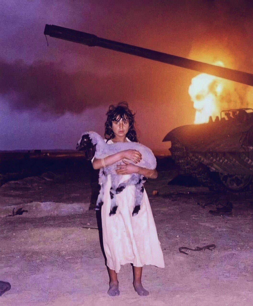 Young Kuwaiti girl holding her lamb, during the Gulf War 1991.jpeg